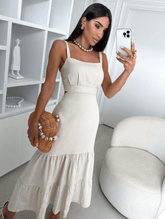 VESTIDO LONGO EM LINHO COM ALÇA REGULÁVEL. ELÁSTICO NAS COSTAS, CAIMENTO SOLTO.